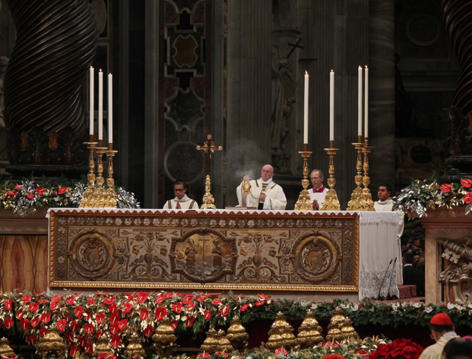Pope Francis celebrates Midnight Mass in St. Peter's Basilica in 2015.