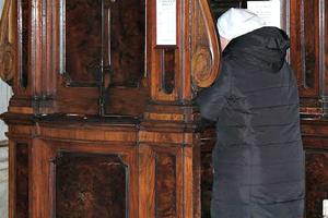 A woman goes to confession at the Basilica of St. Mary Major`s during the during the Vigil for Life in March.
