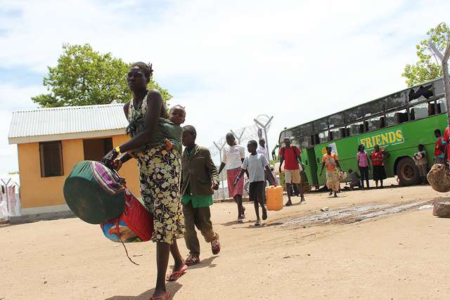 South Sudanese refugees arrive at refugee camps in Uganda. 