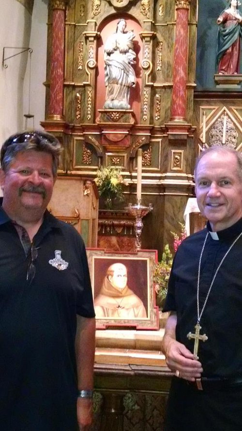 Bishop Paprocki with his cousin Mike Gray at the tomb of Blessed Junipero Serra in Carmel, Calif., where the bishop celebrated Mass.