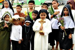 A March of Saints at St. John the Evangelist parish in the Diocese of Malolos, Philippines.

