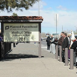 Pro-life advocates pray March 20 in front of the Planned Parenthood Surgical Center in Albuquerque. 