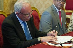 Riad al-Malki, Palestine's foreign minister, signs the ‘Comprehensive Agreement’ between the state of Palestine and the Holy See on June 26.