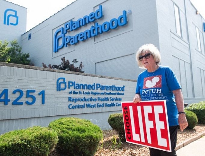 A pro-life demonstrator participates in a protest outside the Planned Parenthood Reproductive Health Services Center in St. Louis May 31. The facility was officially denied its license to perform abortions. 