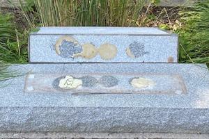 Vandalized monument at Our Lady of the Assumption Church in Bloomingburg, New York. 