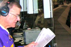 Above, Deacon Dan Borné announcing a game; and, below, ready for his deacon duties, with his wife, Lisette, by his side.