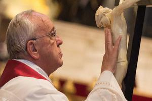 Pope Francis venerates the cross at the liturgy of the Lord's Passion on Good Friday in St. Peter's Basilica on April 3, 2015.