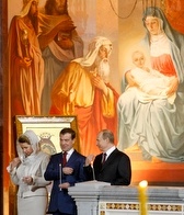 President Medvedev, center, his wife, Svetlana, and Prime Minister Putin.