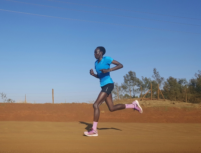 Edna Kiplagat keeps her focus on faith amid training. She attends St. Francis of Assisi in Longmont, Colorado.