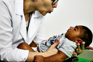 Dr. Stella Guerra performs physical therapy on an infant born with microcephaly at Altino Ventura Foundation on June 2 in Recife, Brazil. Microcephaly is a birth defect linked to the Zika virus, where infants are born with abnormally small heads. A group of health authorities recently called for the Rio 2016 Olympic Games to be postponed or canceled due to the Zika threat, but the World Health Organization rejected the proposal.