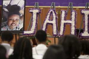 
A photo of Jahi McMath is shown at funeral services for McMath at Acts Full Gospel Church in Oakland, California, July 6. Dozens of family members, friends and other mourners filled the Northern California church for the funeral of the teenage girl at the center of a medical and religious debate over brain death.