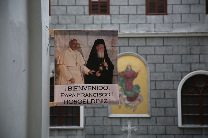 A banner welcoming Pope Francis hangs in Isranbul ahead of his arrival.