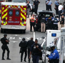 Emergency vehicles and law enforcement personnel respond Sept. 16 to shots at the Washington Navy Yard. 