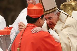 Pope Francis embraces Cardinal Charles Maung Bo of Yangon, Myanmar, during the Ordinary Public Consistory at St. Peter's Basilica on Feb. 14.