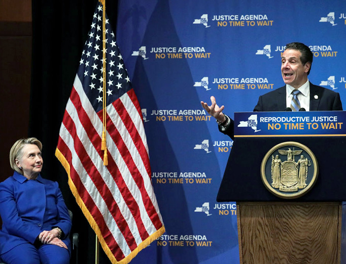 Former presidential candidate Hillary Clinton looks on as New York Governor Andrew Cuomo speaks at a pro-abortion event Jan. 7, 2019, in New York City. The two Democrats shared the stage to promote the Reproductive Health Act in New York, which Cuomo wants the State Legislature to pass in their first 30 days.