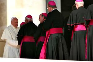 Pope Francis greets bishops and clergy in St. Peter’s Square during the Wednesday general audience on Oct. 1.
