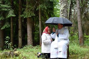 Above, a Catholic priest hears a confession during the annual Mother of Perpetual Help in the forest near the village of Dubok, Belarus, on July 1, 2018. 
