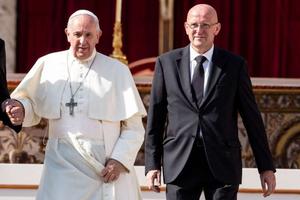 Pope Francis and Domenico Giani walk together on Oct. 13 at the Vatican. 