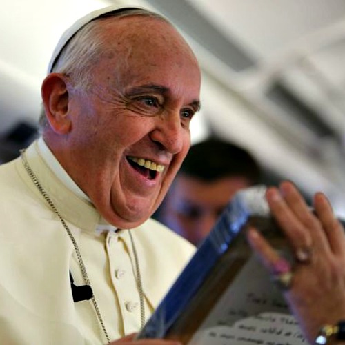 Pope Francis receives a gift of a bas relief of St. Thérèse of Lisieux from a journalist in January.