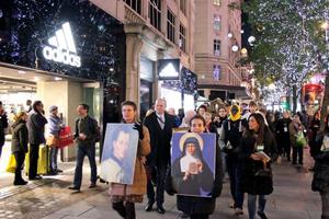 Relics of St. Claude de Colombière and St. Margaret Mary Alacoque are processed through London in 2016.
