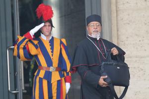 Then-Archbishop Berhaneyesus Demerew Souraphiel, shown departing the Vatican's Synod Hall on Oct. 13, 2014, was created a cardinal in 2015 and is committed to sowing the seeds of peace in his homeland.