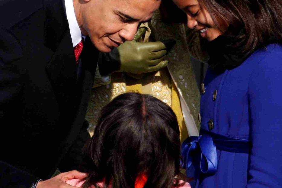 The First Father with daughters Sasha and Malia