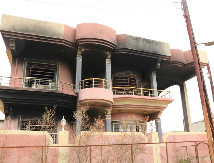 One of many houses set alight or destroyed by ISIS in Karemlash, Iraq.
