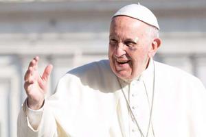Pope Francis waves to pilgrims during his Sept. 13 general audience in St. Peter's Square. 

