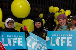 Above, a scene from last year’s event in Chicago. Below, pro-lifers at a past Dallas March for Life and Walk for Life West Coast.