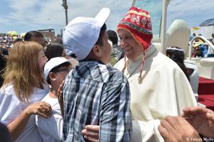 Pope Francis experiments with local fashion trends Jan. 20 in Trujillo, sporting a typical Peruvian chullo hat made of wool. 