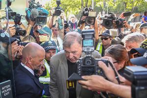 Cardinal George Pell arrives at Melbourne County Court Feb. 27 in Melbourne, Australia. Cardinal Pell was found guilty Dec. 11, but the result was subject to a suppression order and was only able to be reported since Tuesday. 

