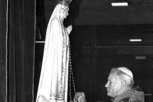 Pope John Paul II prays in front of the statue of the Virgin Mary at the Chapel of the Apparitions in Fatima, May 12, 1982, to give thanks for surviving an assassination attempt in 1981.