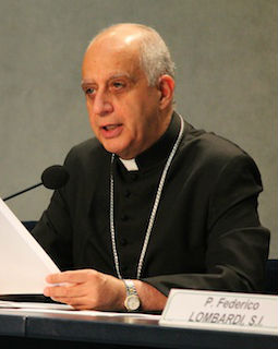 Archbishop Rino Fisichella speaks to the press at a May 15 media event on the Church movements weekend.
