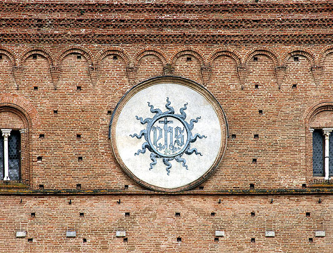 The monogram of our Lord (“IHS”) on the Piazza del Campo in Siena, Italy.
