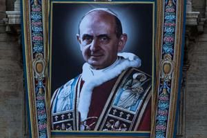 Canonization banner of Paul VI hangs in St. Peter’s Square ahead of his Oct. 14 canonization.