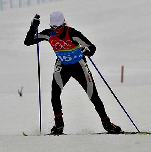 Rebecca Dussault competes in the cross-country skiing event at the 2006 Winter Olympics in Turin, Italy.

