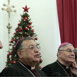 Latin Patriarch Fouad Twal of Jerusalem speaks during a news conference held before his annual pre-Christmas address in Jerusalem’s Old City Dec. 21. The top Catholic clergyman in the Holy Land says that he remains hopeful for a Mideast peace solution, despite the current breakdown in negotiations. 