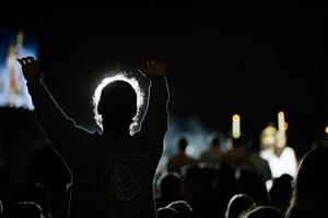 Young people attend adoration at 'SEEK 2019.'