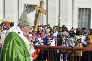 Pope Francis celebrates Mass for the World Day of Migrants and Refugees Sept. 29. 