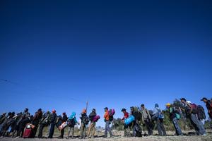 Central American migrants, mostly Hondurans, move in a caravan towards the United States.