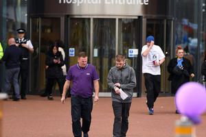 Tom Evans, father of Alfie Evans (C-R), arrives to speak to the media outside Alder Hey Children's Hospital on April 26 in Liverpool, England. The Court of Appeal has upheld a ruling preventing Alfie's parents taking their son for treatment to Italy. 
