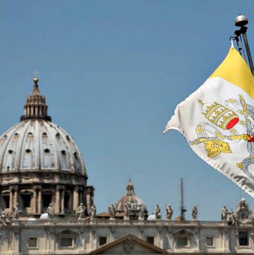 St. Peter’s Basilica and the Vatican flag
