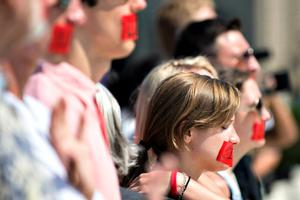 Pro-life activists pray on the steps of the U.S. Supreme Court on June 27 in Washington. In a 5-3 decision, the court said a Texas law that required abortion businesses to conform to state health regulations placed an undue burden on women.