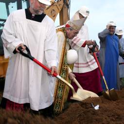 Msgr. Francis Depman, pastor of St. Rocco Parish in Avondale, Pa., participates in a groundbreaking ceremony in mid-August with Philadelphia Cardinal Justin Rigali, Msgr. Joseph Marino, regional vicar for Chester County, Pa., and Mother Maria del Cenaculo, a member of the Servants of the Lord and the Virgin of Matara. A new church will be built for the parish, which will become a national parish to serve the needs of Spanish-speaking Catholics. 