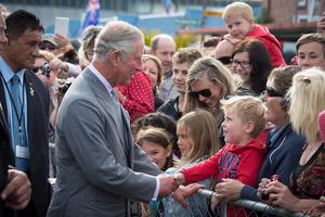 Prince Charles greets people during a visit to Westport, New Zealand, on Nov. 7, 2015.