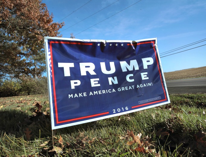 A campaign sign showing support for President-elect Donald Trump sits along a rural highway on Nov. 9 near Belvidere, Illinois. Below, Trump and his campaign manager, Kellyanne Conway, a Catholic. A campaign sign showing support for President-elect Donald Trump sits along a rural highway on Nov. 9 near Belvidere, Illinois. Below, Trump and his campaign manager, Kellyanne Conway, a Catholic.