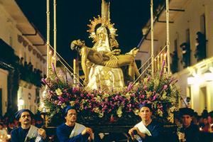 Participants carry a sacred imagene during a Holy Week procession in Popayán, Colombia.