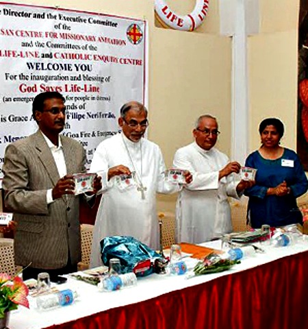 Archbishop Filipe Neri (second from left) launches the suicide-prevention help line with director Father Mario Saturnino Dias (second from right).

