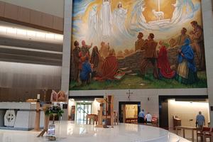 The 1879 apparition of the Virgin Mary, St. Joseph, St. John the Evangelist, angels and the Lamb of God is commemorated inside the Knock Shrine.
