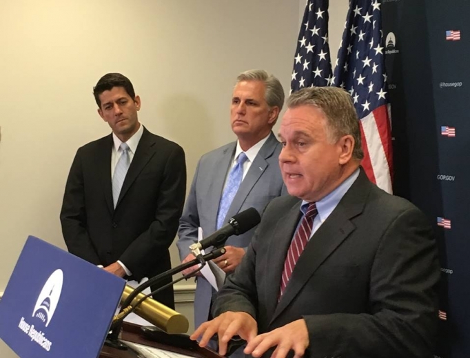Rep. Chris Smith (r) at a July 12 press conference about the Frederick Douglass Trafficking Victims Prevention and Protection Reauthorization Act (H.R. 2200), with House Speaker Paul Ryan (l) and House Majority Leader Kevin McCarthy (c). 